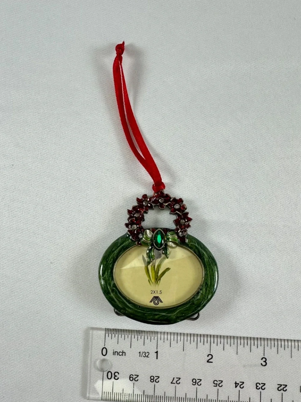 Enamel Red Poinsettia Wreath Christmas Ornament With Green Stone on Bow Frame